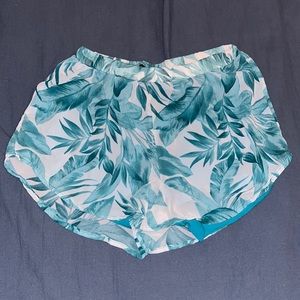 Leaf/floral print shorts